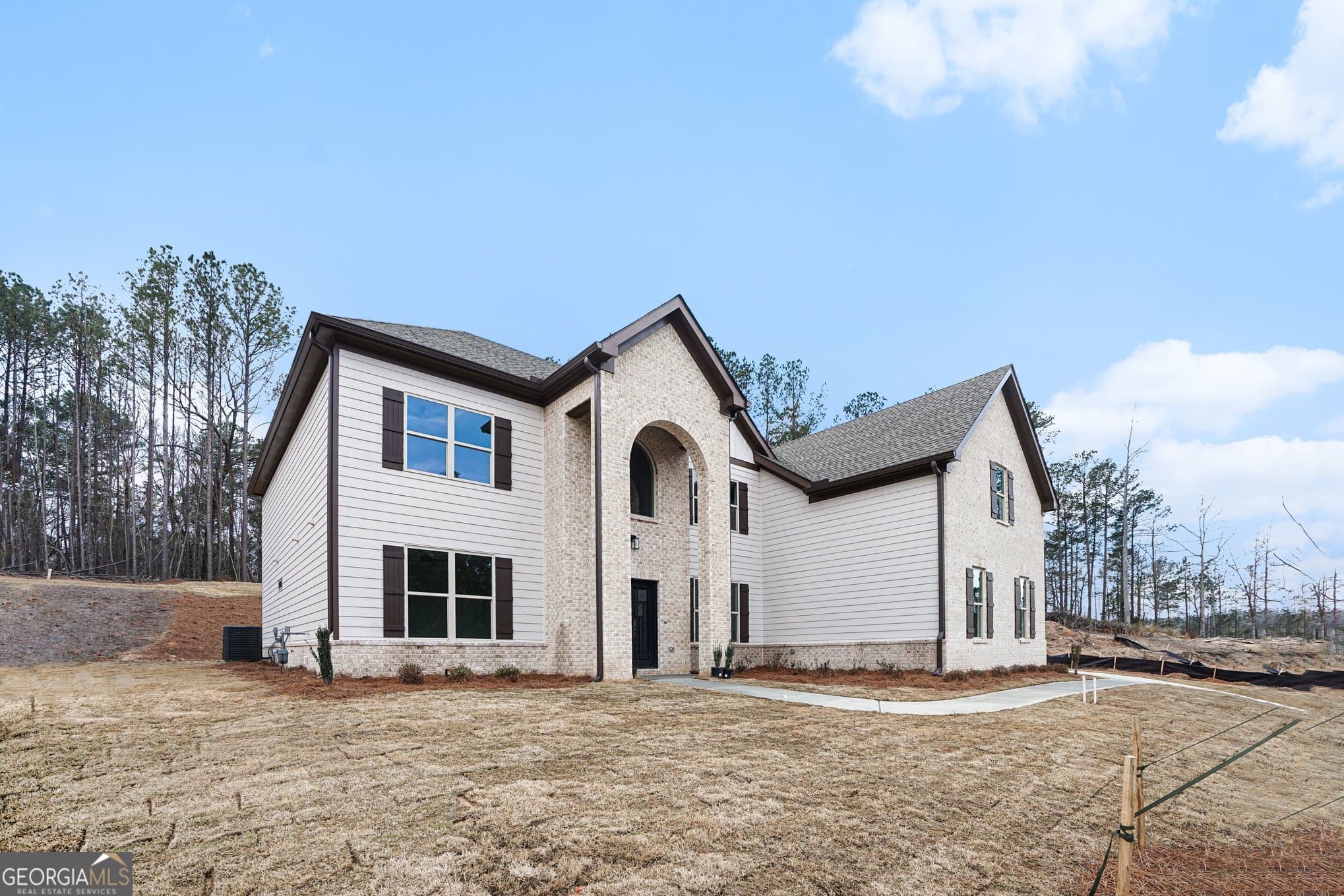4 bedroom, 4.5 bathroom, 3,628 sq ft single family residence for sale at 4457 Meadowwood Drive, Loganville, GA 30052 — photo 3
