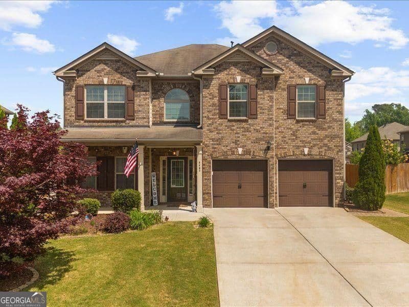 4 bedroom, 2.5 bathroom, 3,318 sq ft single family residence for sale at 5680 Banner Boulevard, Cumming, GA 30028 — photo 2