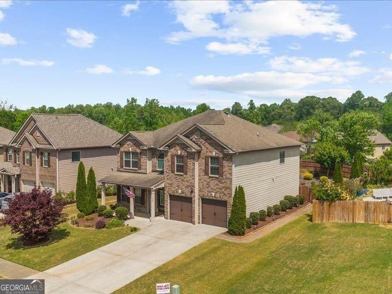 4 bedroom, 2.5 bathroom, 3,318 sq ft single family residence for sale at 5680 Banner Boulevard, Cumming, GA 30028 — photo 3
