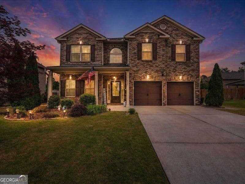 4 bedroom, 2.5 bathroom, 3,318 sq ft single family residence for sale at 5680 Banner Boulevard, Cumming, GA 30028 — photo 1 of 39