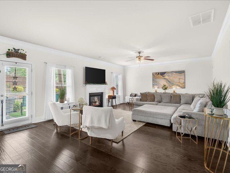 4 bedroom, 2.5 bathroom, 3,318 sq ft single family residence for sale at 5680 Banner Boulevard, Cumming, GA 30028 — photo 9