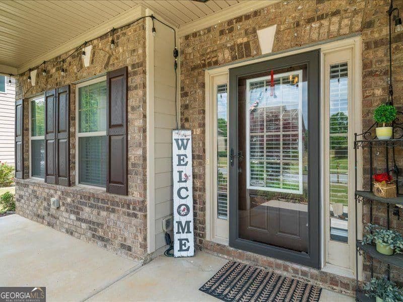 4 bedroom, 2.5 bathroom, 3,318 sq ft single family residence for sale at 5680 Banner Boulevard, Cumming, GA 30028 — photo 4
