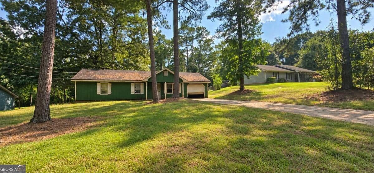 3 bedroom, 2 bathroom, 1,287 sq ft single family residence for sale at 810 Navajo Trail, Covington, GA 30016 — photo 2