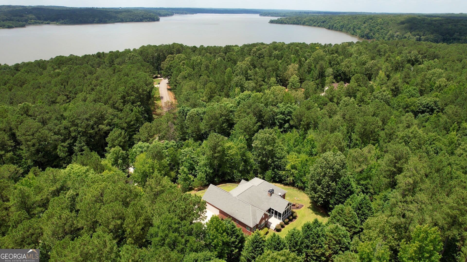 3 bedroom, 2 bathroom, 2,363 sq ft single family residence for sale at 1670 Northwoods Drive, Greensboro, GA 30642 — photo 2