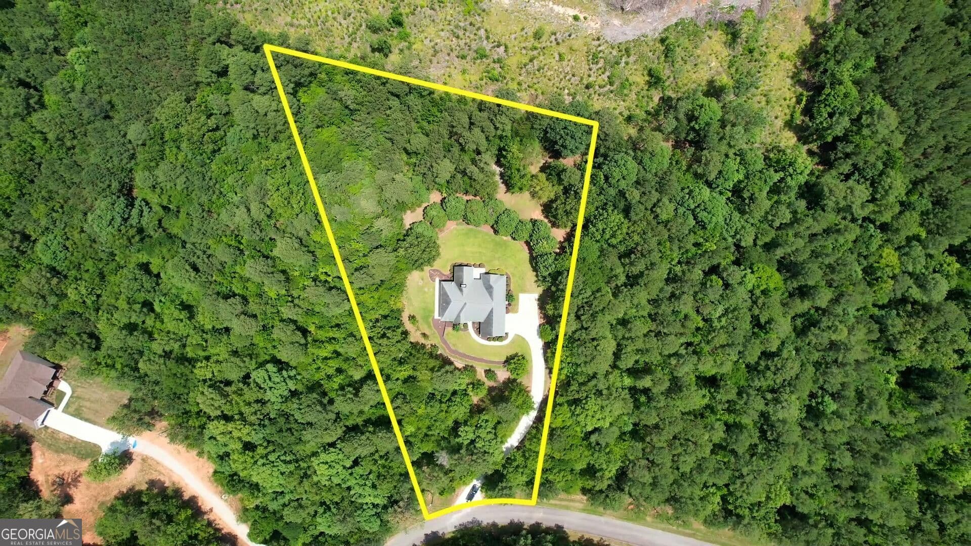 3 bedroom, 2 bathroom, 2,363 sq ft single family residence for sale at 1670 Northwoods Drive, Greensboro, GA 30642 — photo 3