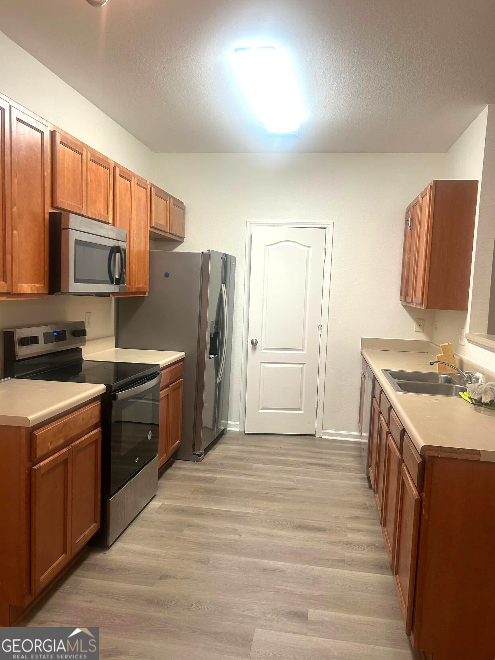 4 bedroom, 2.5 bathroom, 1,700 sq ft townhouse for rent at 1253 Chinon Point, Lithonia, GA 30058 for $1,800 a month — photo 1 of 1