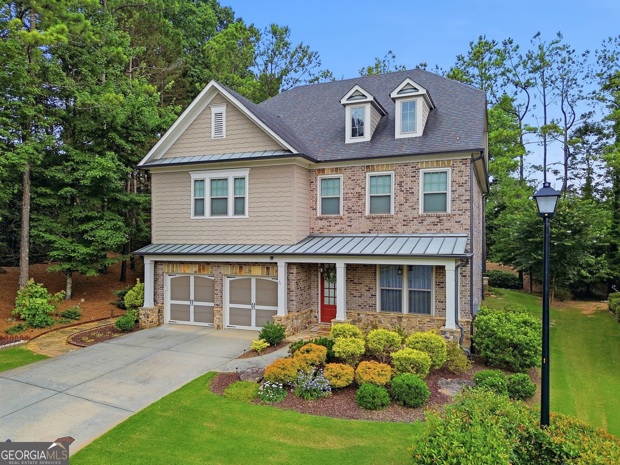 5 bedroom, 4 bathroom, 3,594 sq ft single family residence for sale at 4020 Claiborne Farm Road, Suwanee, GA 30024 — photo 2