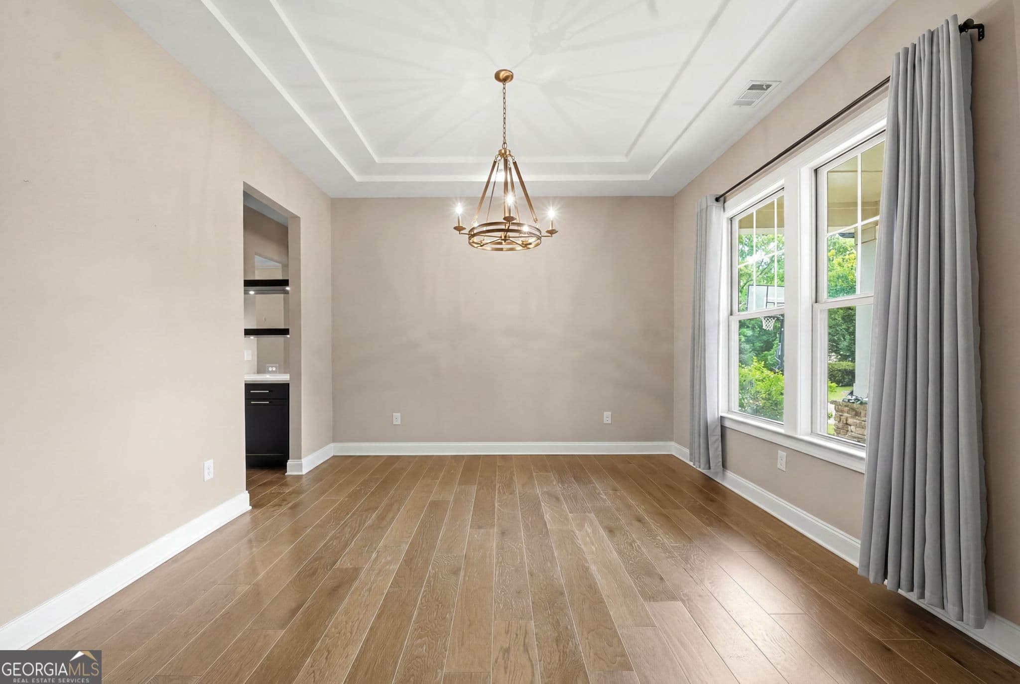 5 bedroom, 4 bathroom, 3,594 sq ft single family residence for sale at 4020 Claiborne Farm Road, Suwanee, GA 30024 — photo 5