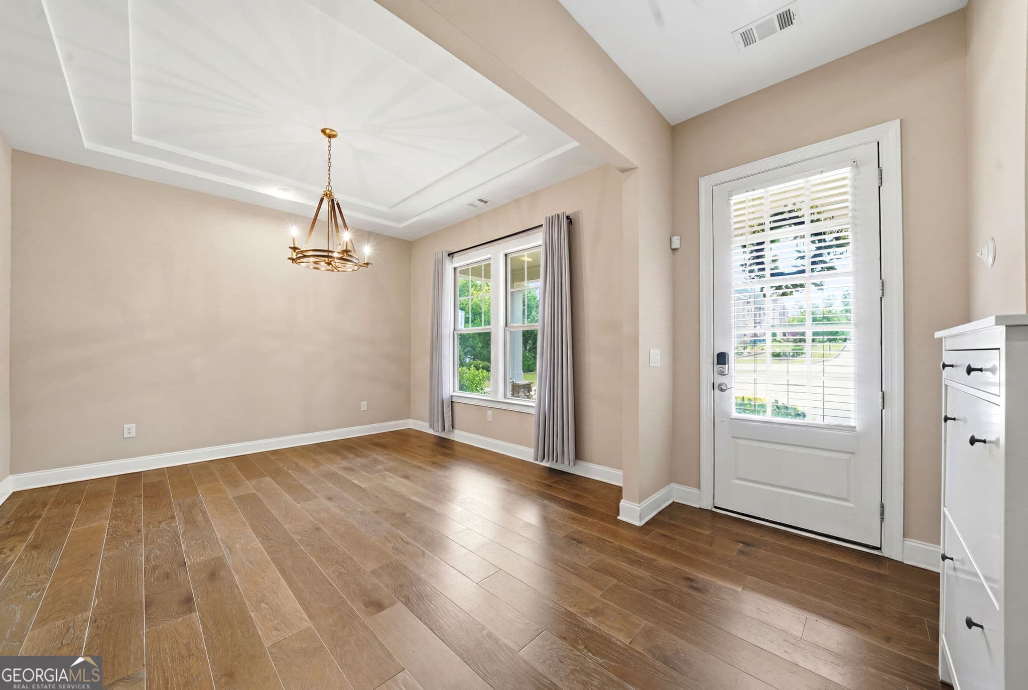5 bedroom, 4 bathroom, 3,594 sq ft single family residence for sale at 4020 Claiborne Farm Road, Suwanee, GA 30024 — photo 4