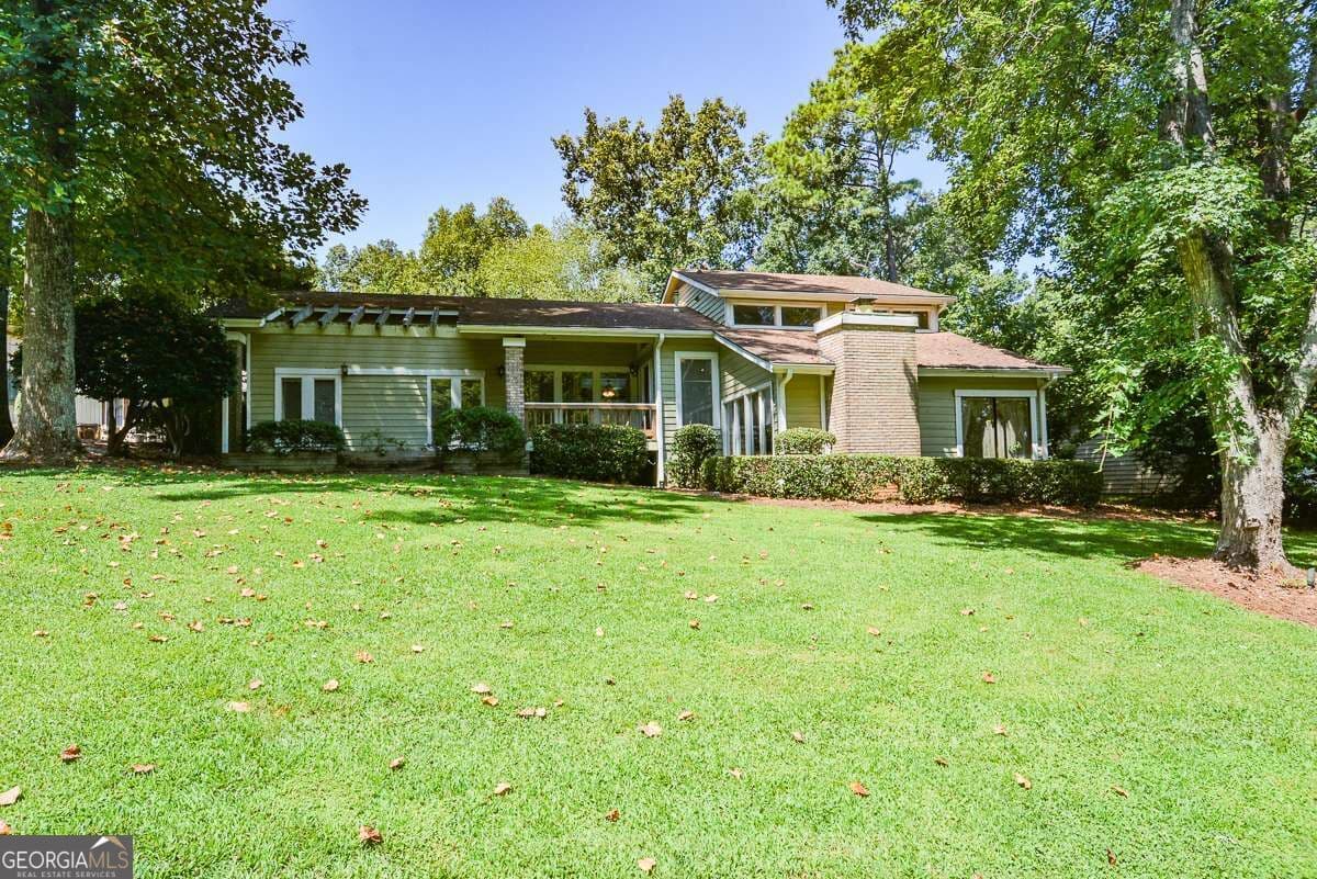 4 bedroom, 3.5 bathroom, 2,635 sq ft single family residence for sale at 6838 Springwood Drive, Douglasville, GA 30135 — photo 2