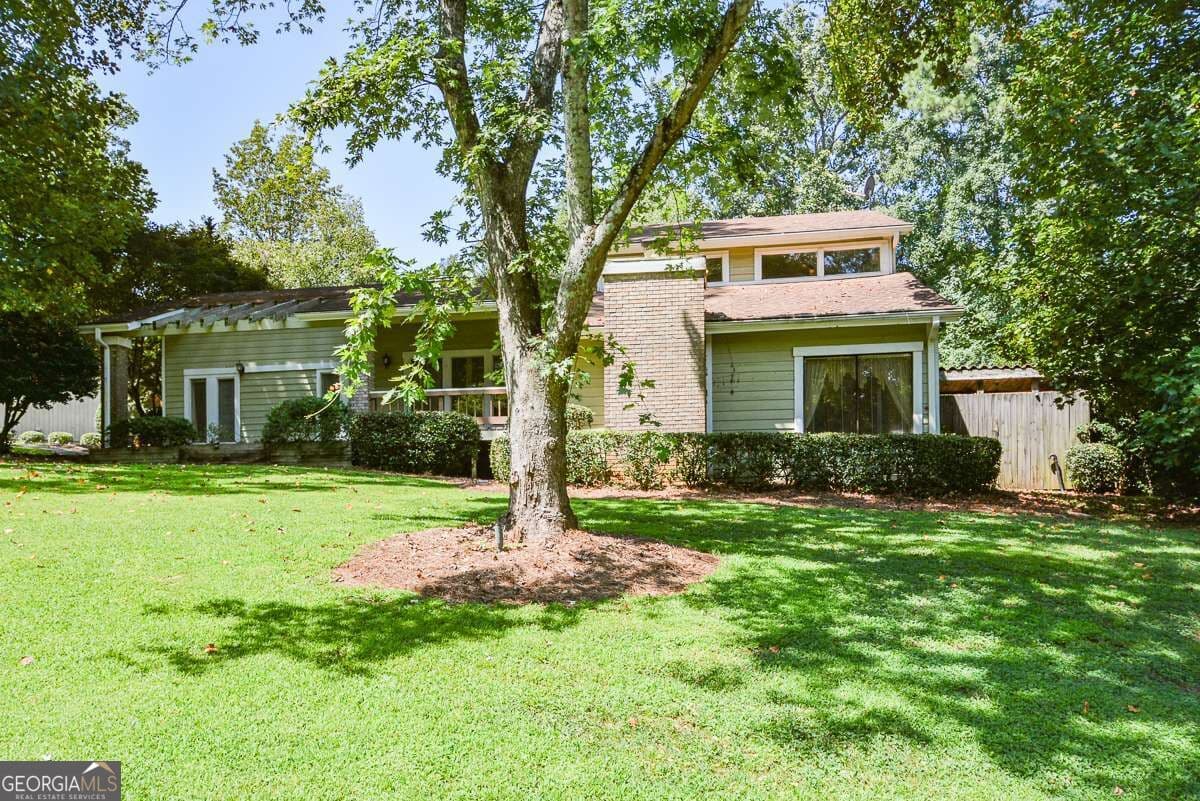 4 bedroom, 3.5 bathroom, 2,635 sq ft single family residence for sale at 6838 Springwood Drive, Douglasville, GA 30135 — photo 3