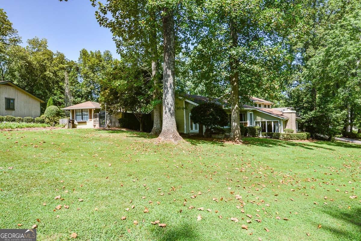 4 bedroom, 3.5 bathroom, 2,635 sq ft single family residence for sale at 6838 Springwood Drive, Douglasville, GA 30135 — photo 5