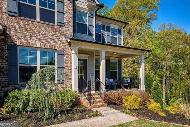 6 bedroom, 5 bathroom single family residence for sale at 8455 Post Oak Lane, Gainesville, GA 30506 — photo 2