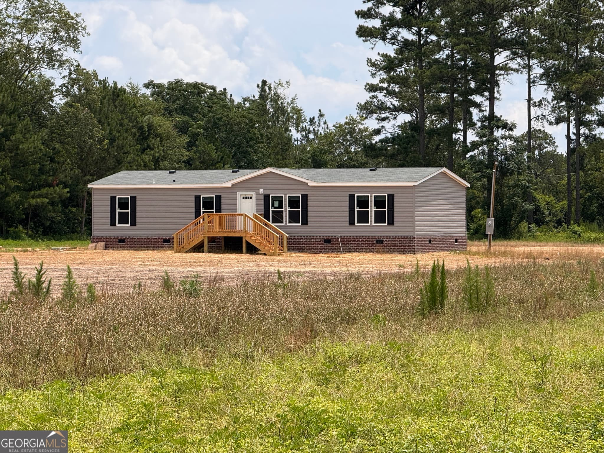 4 bedroom, 3 bathroom, 1,560 sq ft manufactured home,single family residence sold at 558 Mosley Bridge Road, Claxton, GA 30417