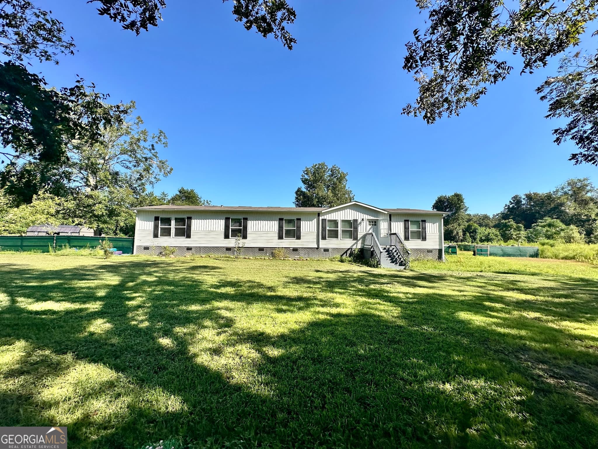 4 bedroom, 2 bathroom, 2,304 sq ft single family residence sold at 4003 Oxford Lane, Blackshear, GA 31516