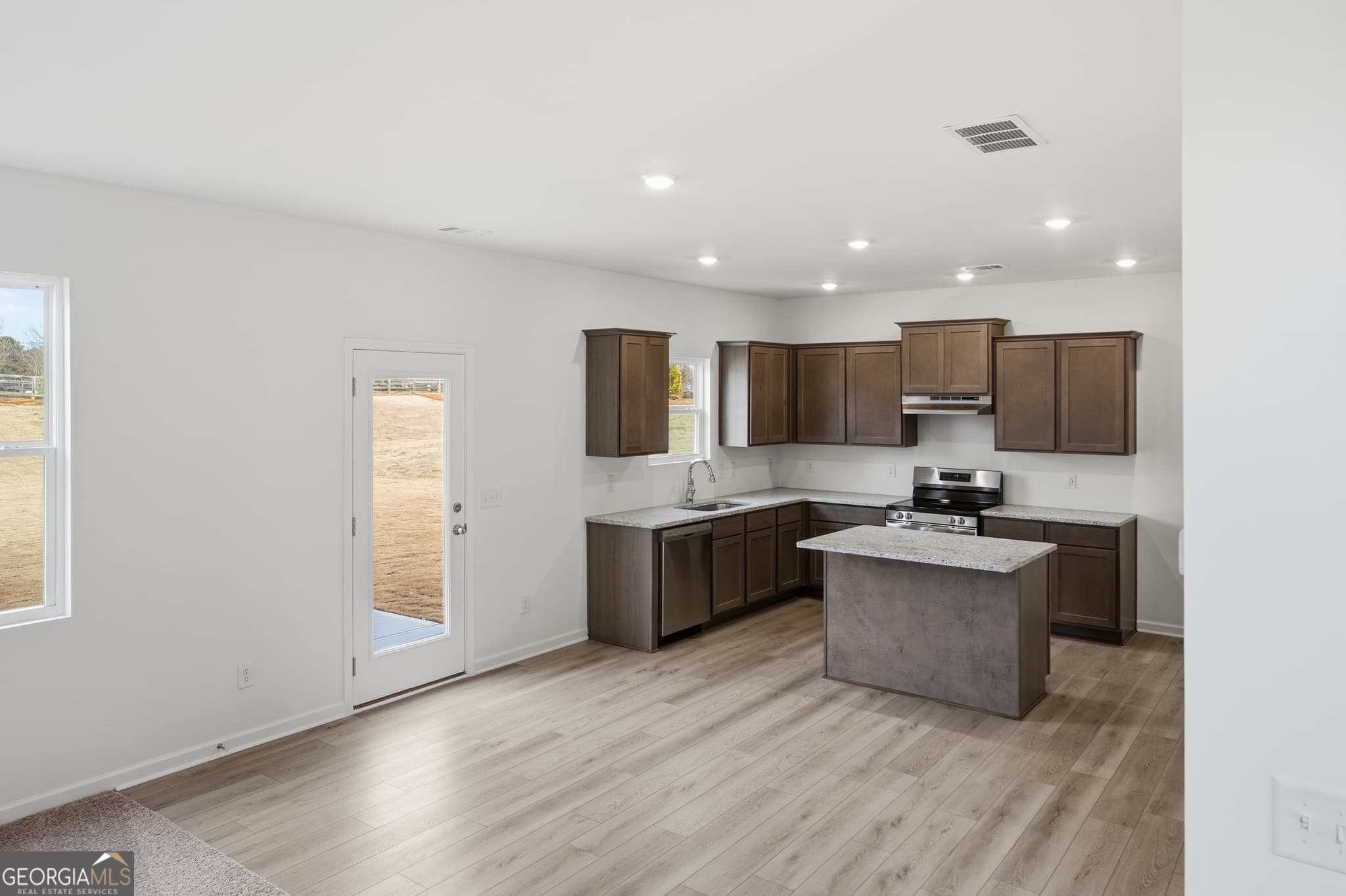 4 bedroom, 2.5 bathroom, 2,200 sq ft single family residence for sale at 4126 Eberly Way 125, Flowery Branch, GA 30542 — photo 8