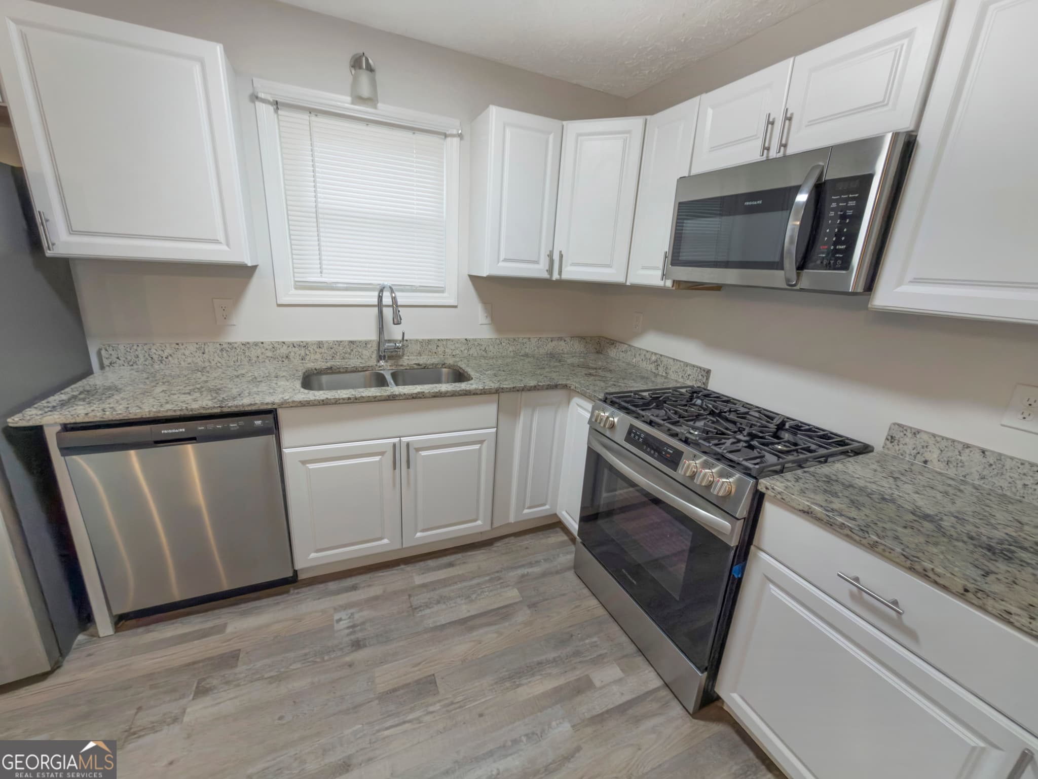 3 bedroom, 2 bathroom, 1,150 sq ft single family residence for sale at 675 Lakeridge Drive, Conyers, GA 30094 — photo 7