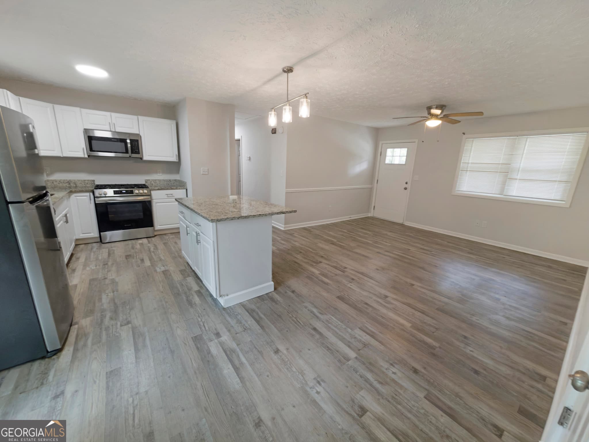 3 bedroom, 2 bathroom, 1,150 sq ft single family residence for sale at 675 Lakeridge Drive, Conyers, GA 30094 — photo 5