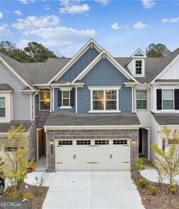 3 bedroom, 2.5 bathroom, 1,882 sq ft townhouse for sale at 2009 Lanier Harbor Point, Buford, GA 30518 — photo 1 of 19