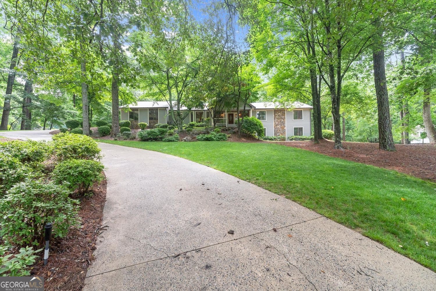 4 bedroom, 3.5 bathroom, 4,287 sq ft single family residence sold at 2125 Double Creek Lane, Alpharetta, GA 30004