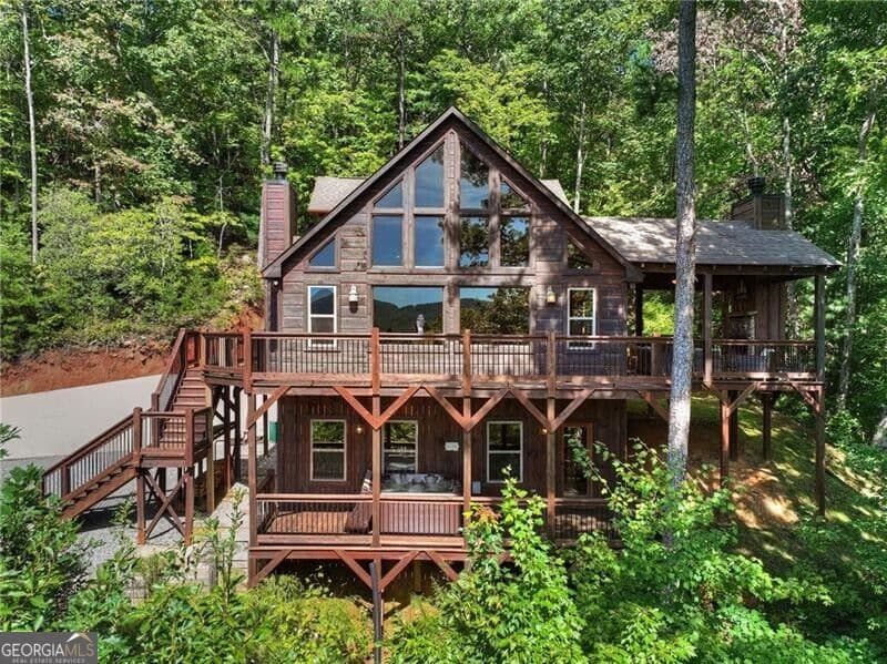 3 bedroom, 3 bathroom, 2,520 sq ft cabin,single family residence for sale at 300 Cloudland Trace, Epworth, GA 30541 — photo 2