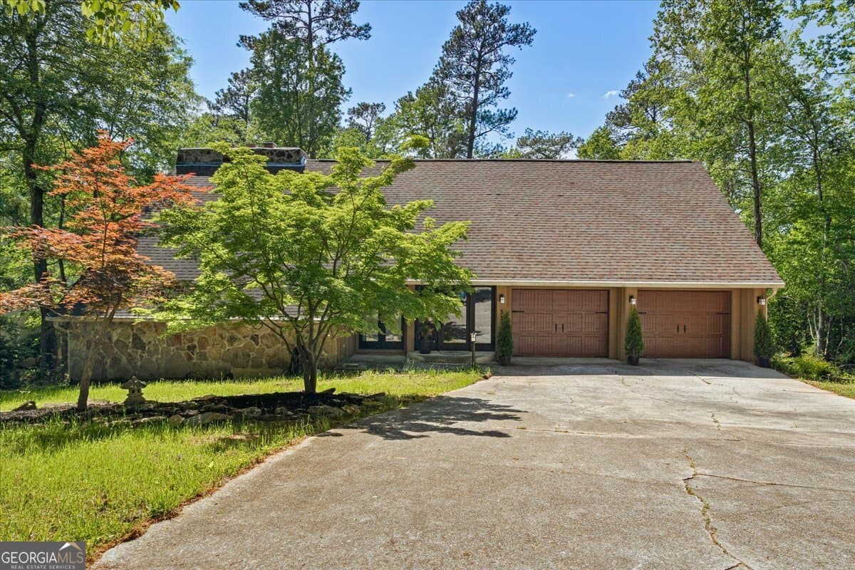 4 bedroom, 2.5 bathroom, 3,525 sq ft single family residence sold at 5159 SW East Shore Drive, Conyers, GA 30094