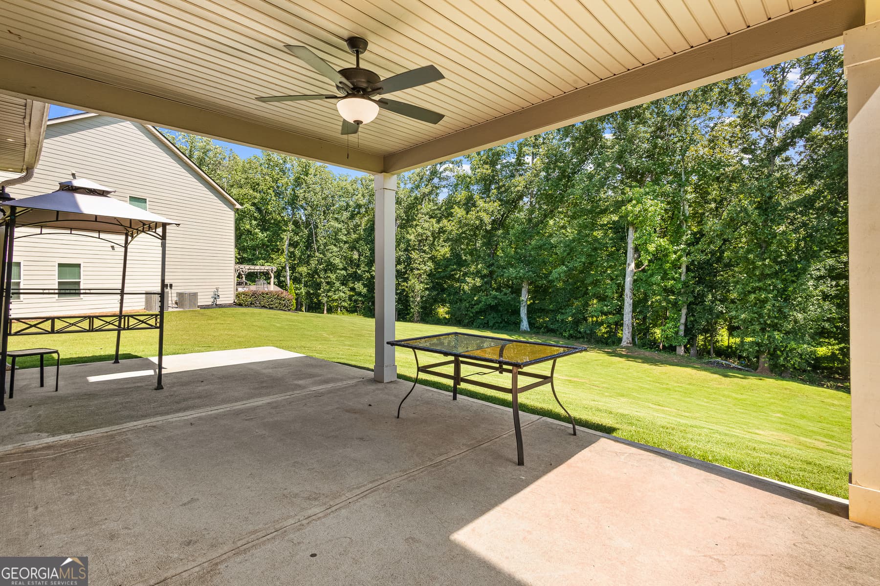 5 bedroom, 3 bathroom, 3,542 sq ft single family residence for sale at 384 Traditions Lane, Hampton, GA 30228 — photo 5