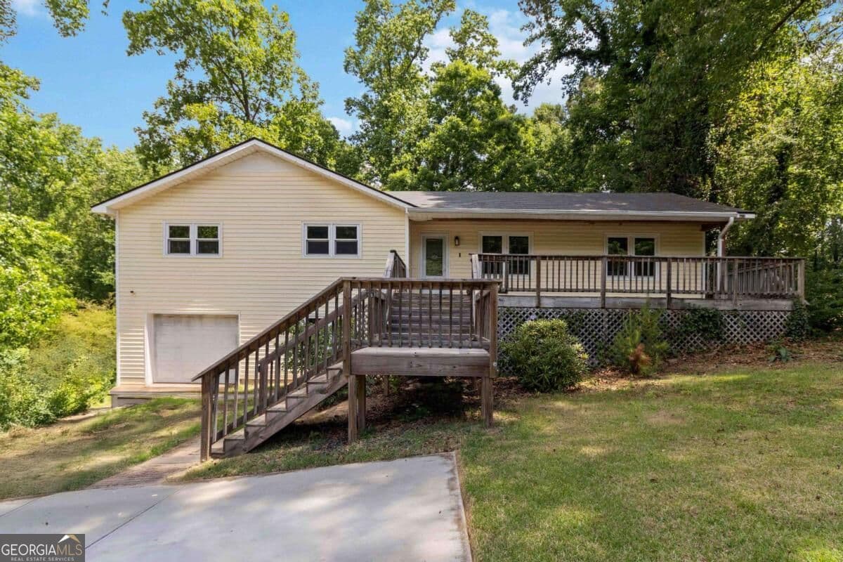 4 bedroom, 2 bathroom, 1,388 sq ft single family residence for sale at 606 Echo Lane, Woodstock, GA 30189 — photo 2