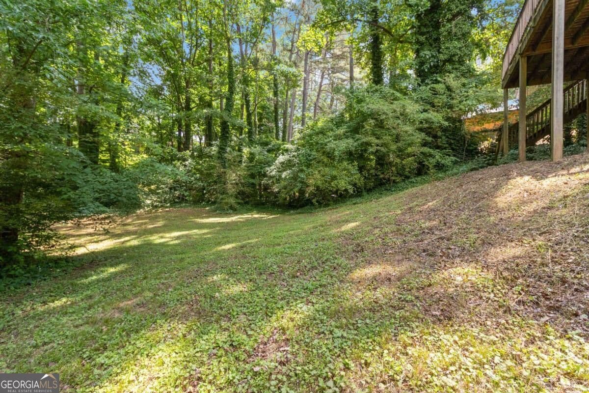 4 bedroom, 2 bathroom, 1,388 sq ft single family residence for sale at 606 Echo Lane, Woodstock, GA 30189 — photo 6