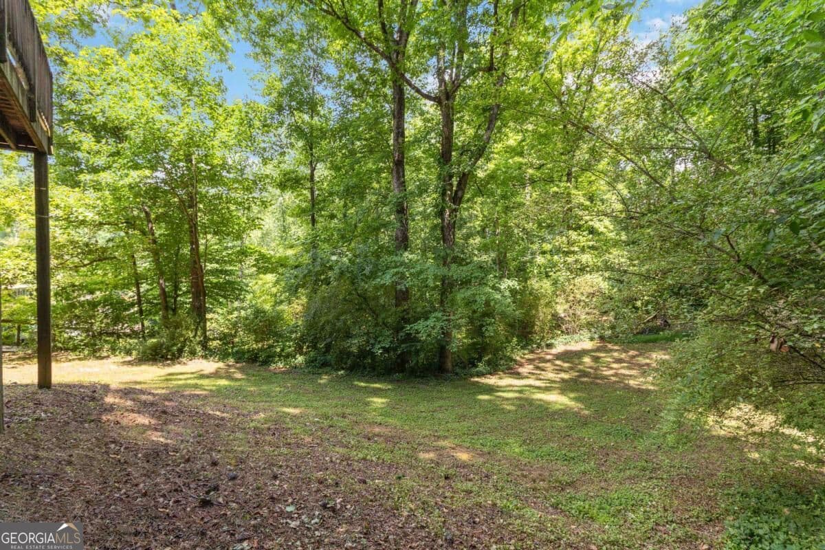 4 bedroom, 2 bathroom, 1,388 sq ft single family residence for sale at 606 Echo Lane, Woodstock, GA 30189 — photo 4
