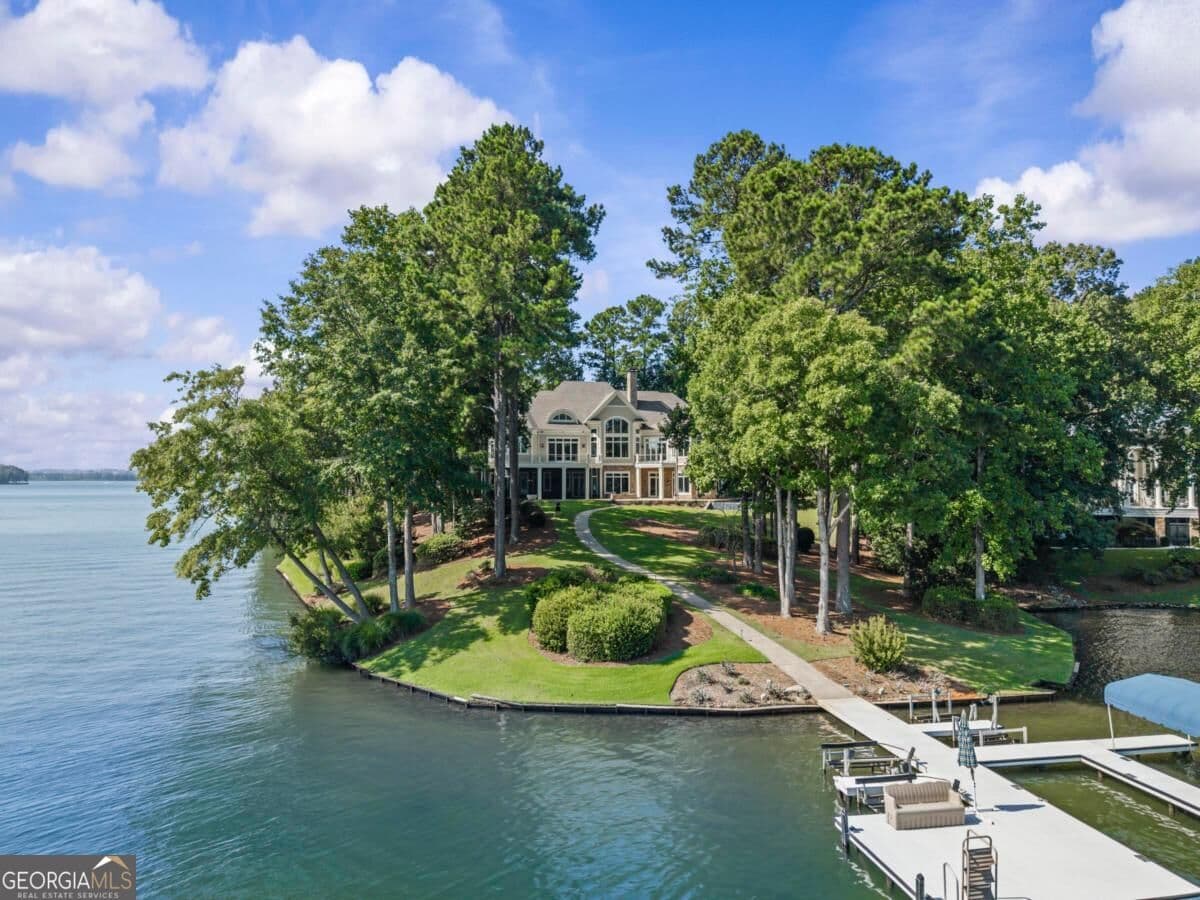 5 bedroom, 6 bathroom, 8,706 sq ft single family residence for sale at 1080 Prosperity Pointe, Greensboro, GA 30642 — photo 2