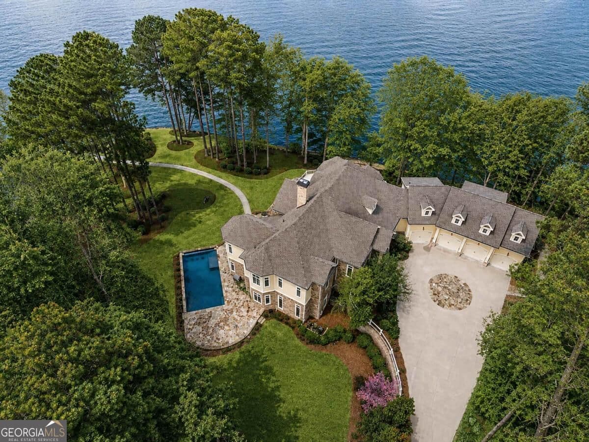 5 bedroom, 6 bathroom, 8,706 sq ft single family residence for sale at 1080 Prosperity Pointe, Greensboro, GA 30642