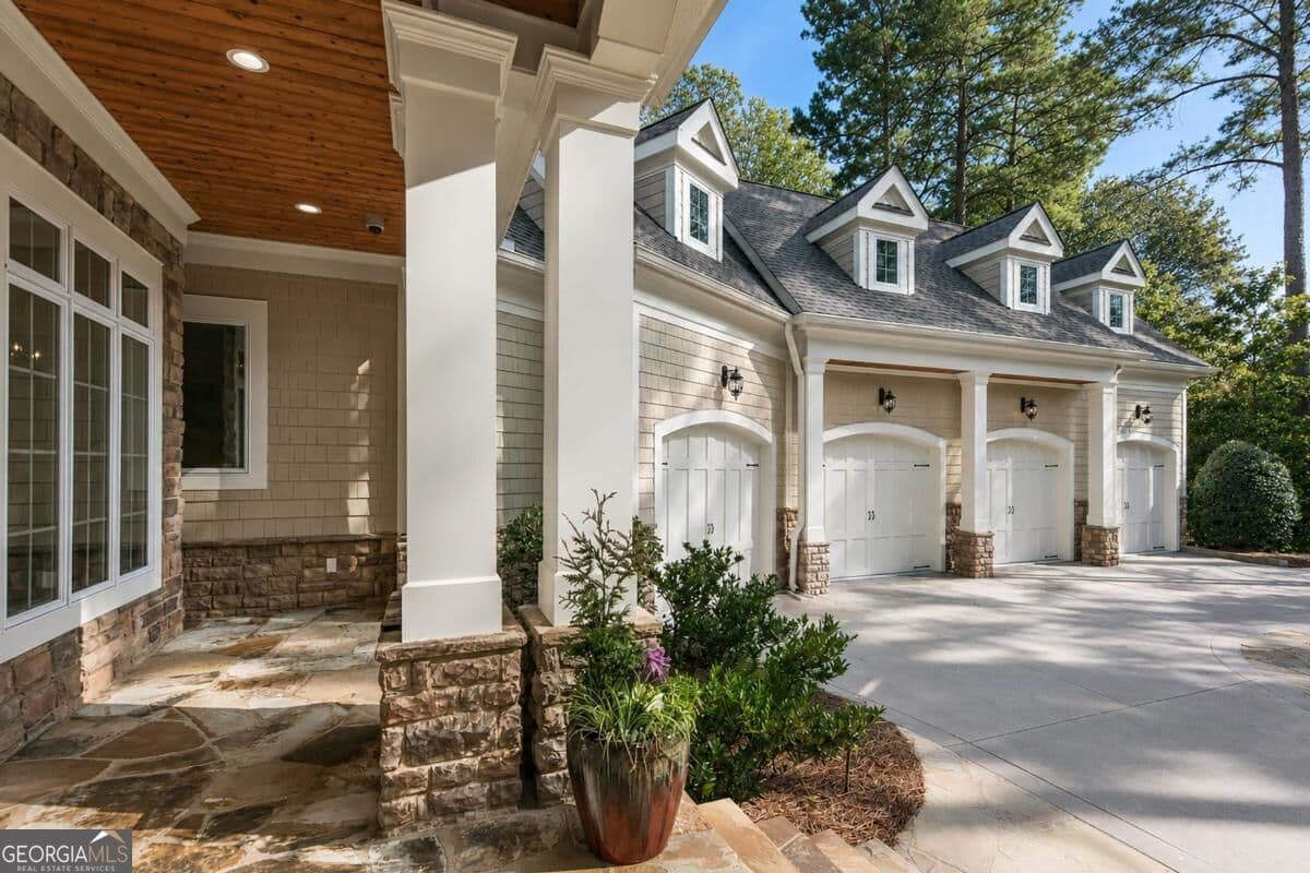 5 bedroom, 6 bathroom, 8,706 sq ft single family residence for sale at 1080 Prosperity Pointe, Greensboro, GA 30642 — photo 9