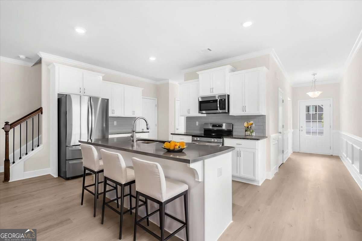 4 bedroom, 2.5 bathroom, 2,500 sq ft single family residence for sale at 4462 Highland Gate Parkway, Gainesville, GA 30506 — photo 6