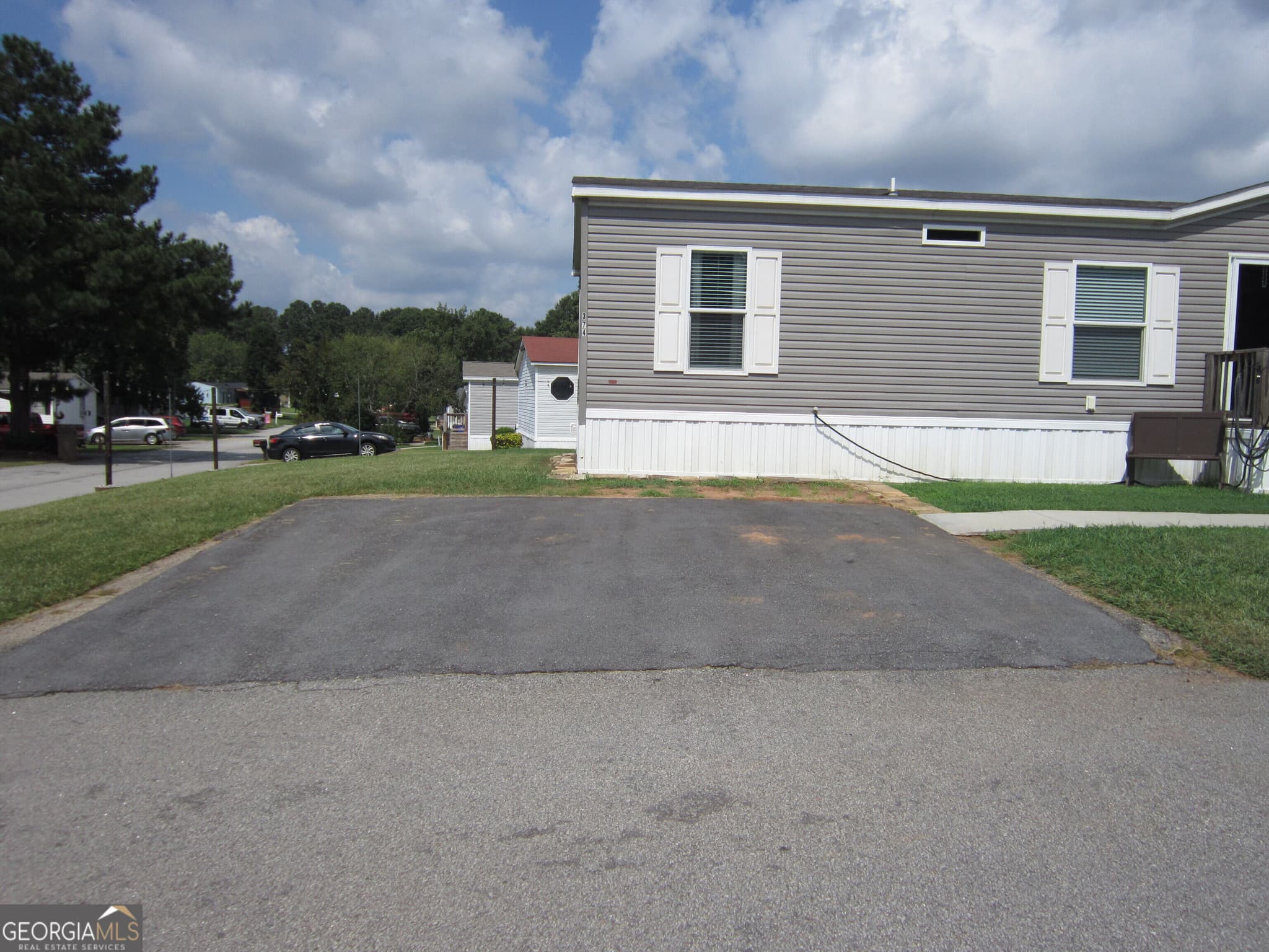 3 bedroom, 2 bathroom, 1,568 sq ft manufactured home,single family residence for sale at 374 Robin Lane # 374R, Mcdonough, GA 30253 — photo 2