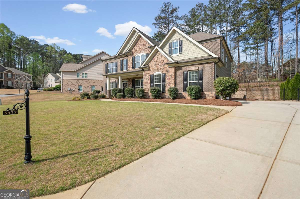 5 bedroom, 4 bathroom, 3,390 sq ft single family residence for sale at 5472 Heatherbrooke Drive, Acworth, GA 30101 — photo 2