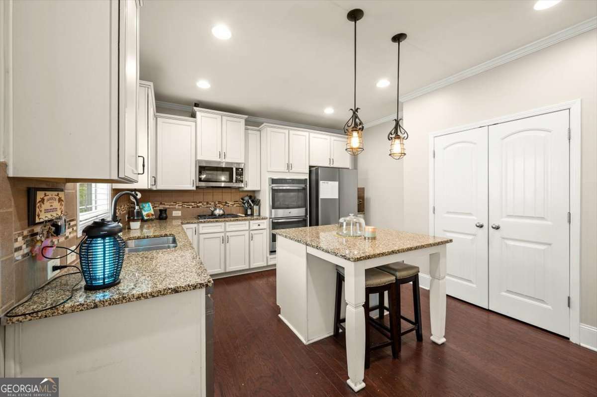 5 bedroom, 4 bathroom, 3,390 sq ft single family residence for sale at 5472 Heatherbrooke Drive, Acworth, GA 30101 — photo 10