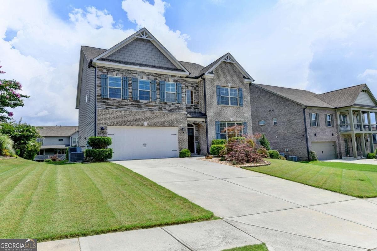 4 bedroom, 4 bathroom, 3,342 sq ft single family residence for sale at 4177 Heisenberg Lane, Suwanee, GA 30024 — photo 2