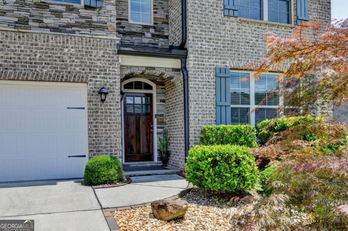 4 bedroom, 4 bathroom, 3,342 sq ft single family residence for sale at 4177 Heisenberg Lane, Suwanee, GA 30024 — photo 4