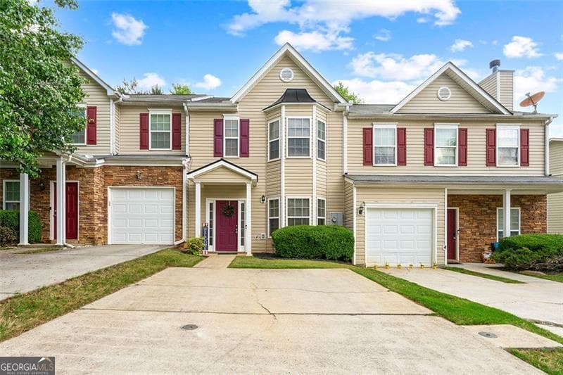 2 bedroom, 2.5 bathroom, 1,432 sq ft townhouse sold at 5221 TIMBER HILLS Drive, Oakwood, GA 30566