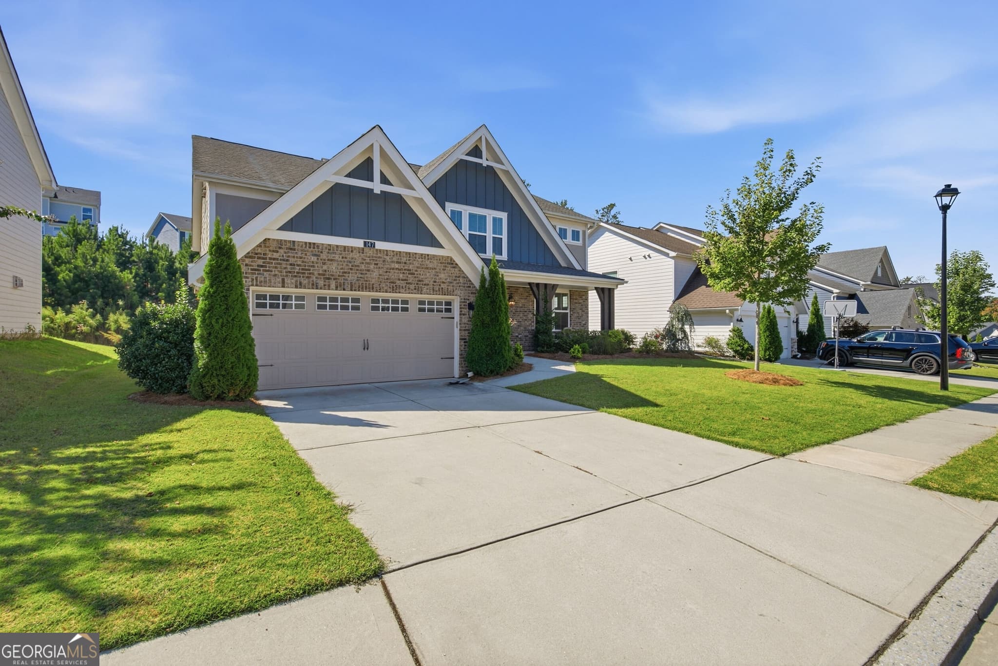 5 bedroom, 4.5 bathroom, 3,147 sq ft single family residence for sale at 147 Michigan Circle, Hoschton, GA 30548 — photo 2