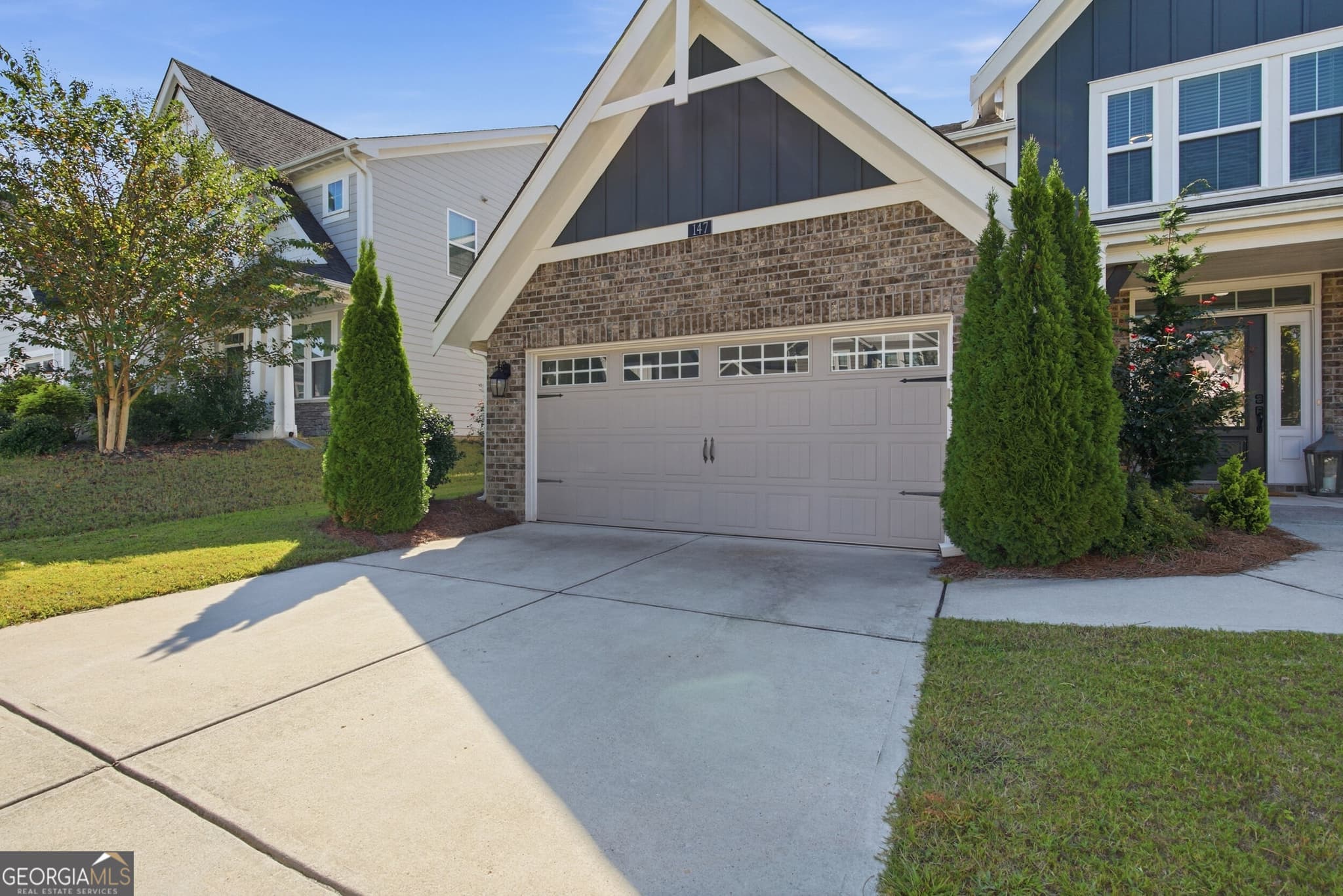 5 bedroom, 4.5 bathroom, 3,147 sq ft single family residence for sale at 147 Michigan Circle, Hoschton, GA 30548 — photo 3