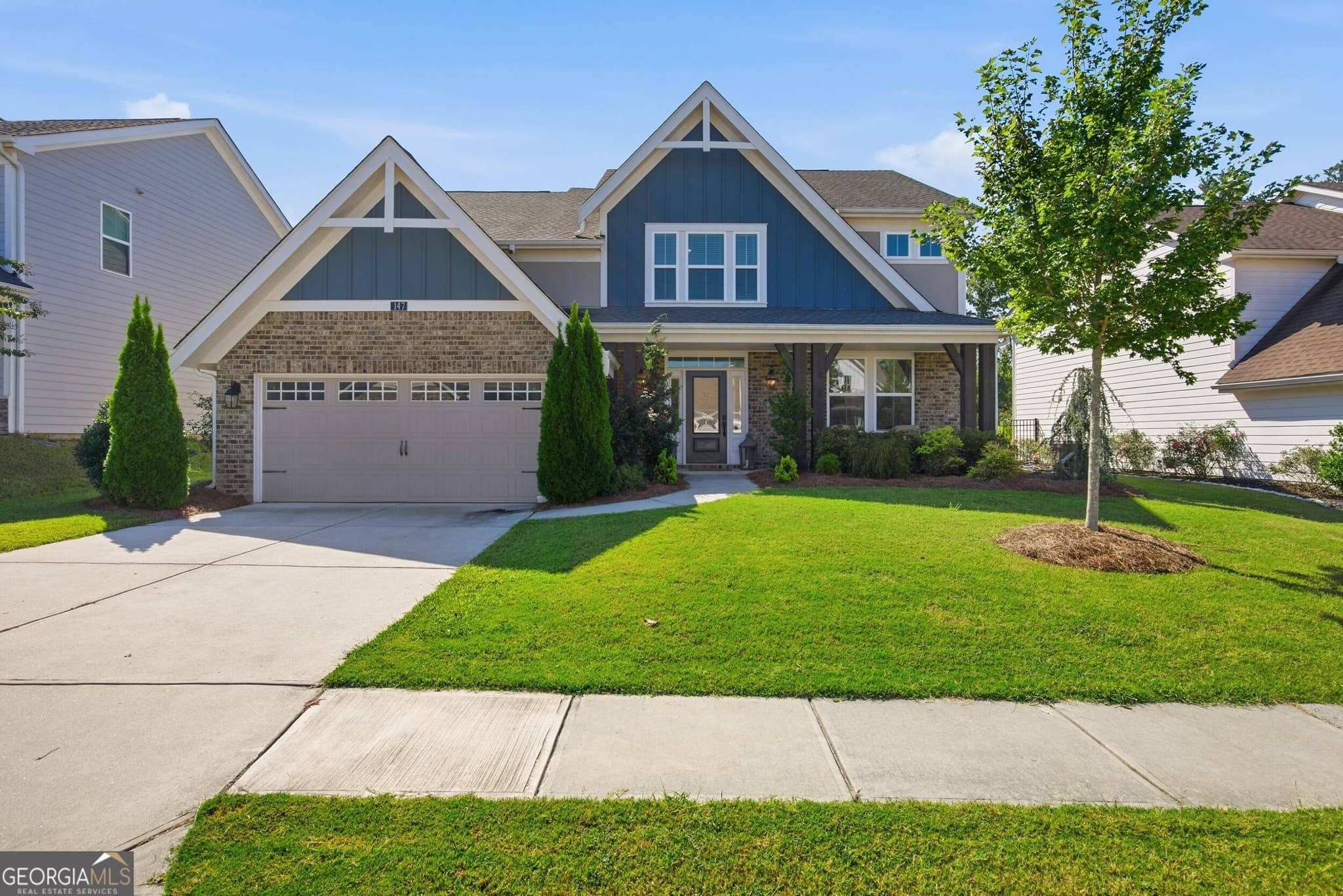 5 bedroom, 4.5 bathroom, 3,147 sq ft single family residence for sale at 147 Michigan Circle, Hoschton, GA 30548 — photo 1 of 70