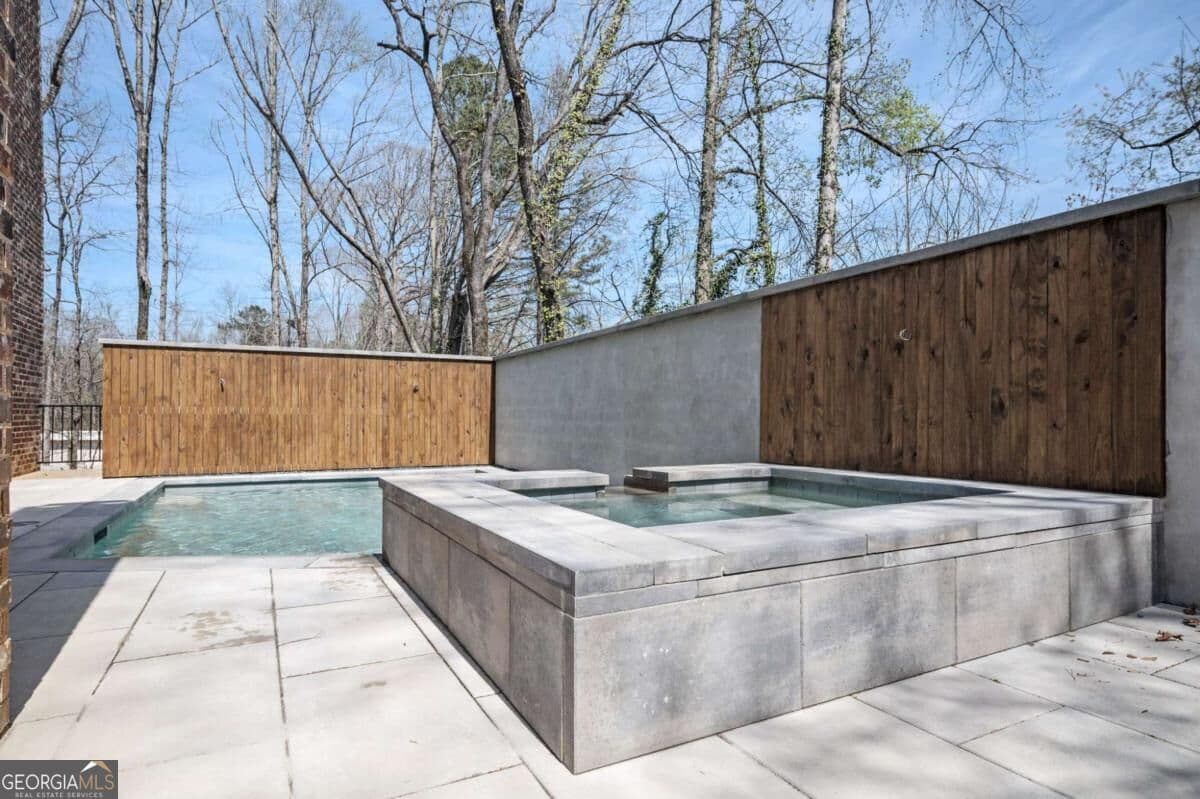 5 bedroom, 7 bathroom, 10,002 sq ft single family residence for sale at 1710 Adams Drive, Atlanta, GA 30311 — photo 4