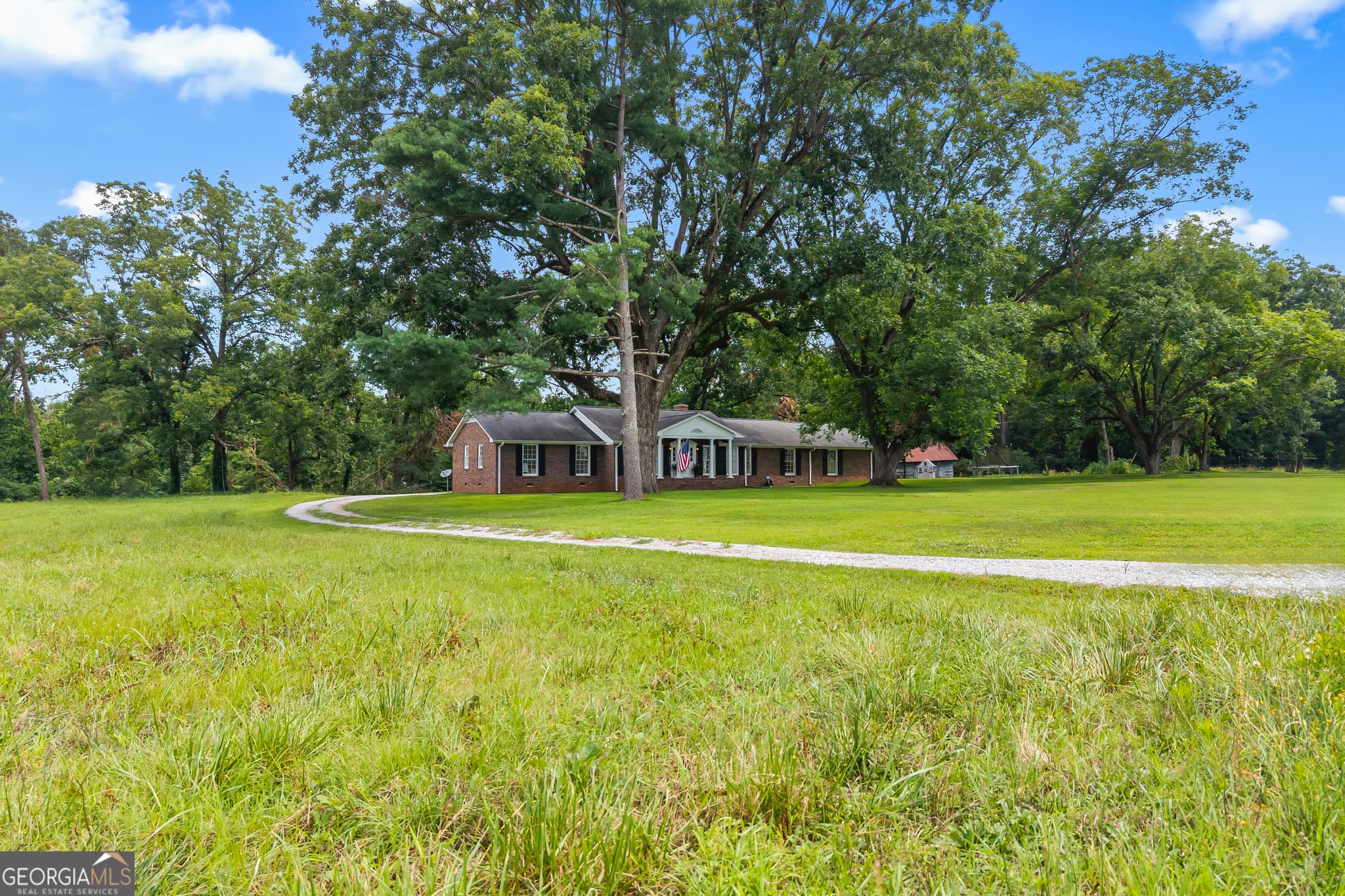 4 bedroom, 2.5 bathroom, 2,560 sq ft single family residence for sale at 16530 Highway 59, Carnesville, GA 30521 — photo 2