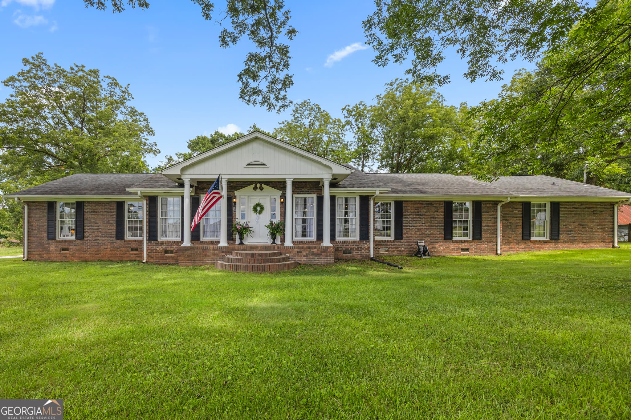 4 bedroom, 2.5 bathroom, 2,560 sq ft single family residence for sale at 16530 Highway 59, Carnesville, GA 30521 — photo 5