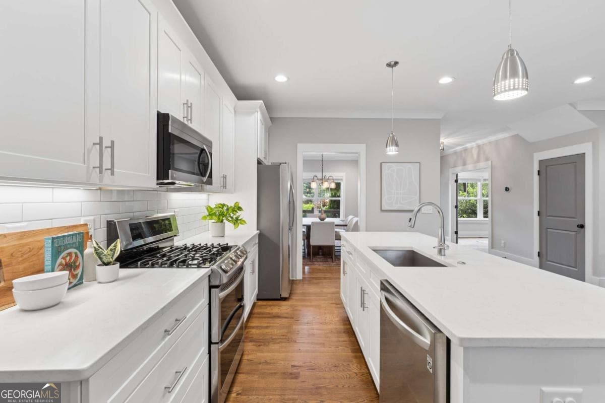 5 bedroom, 3 bathroom, 3,300 sq ft single family residence for sale at 859 East Avenue, Scottdale, GA 30079 — photo 3