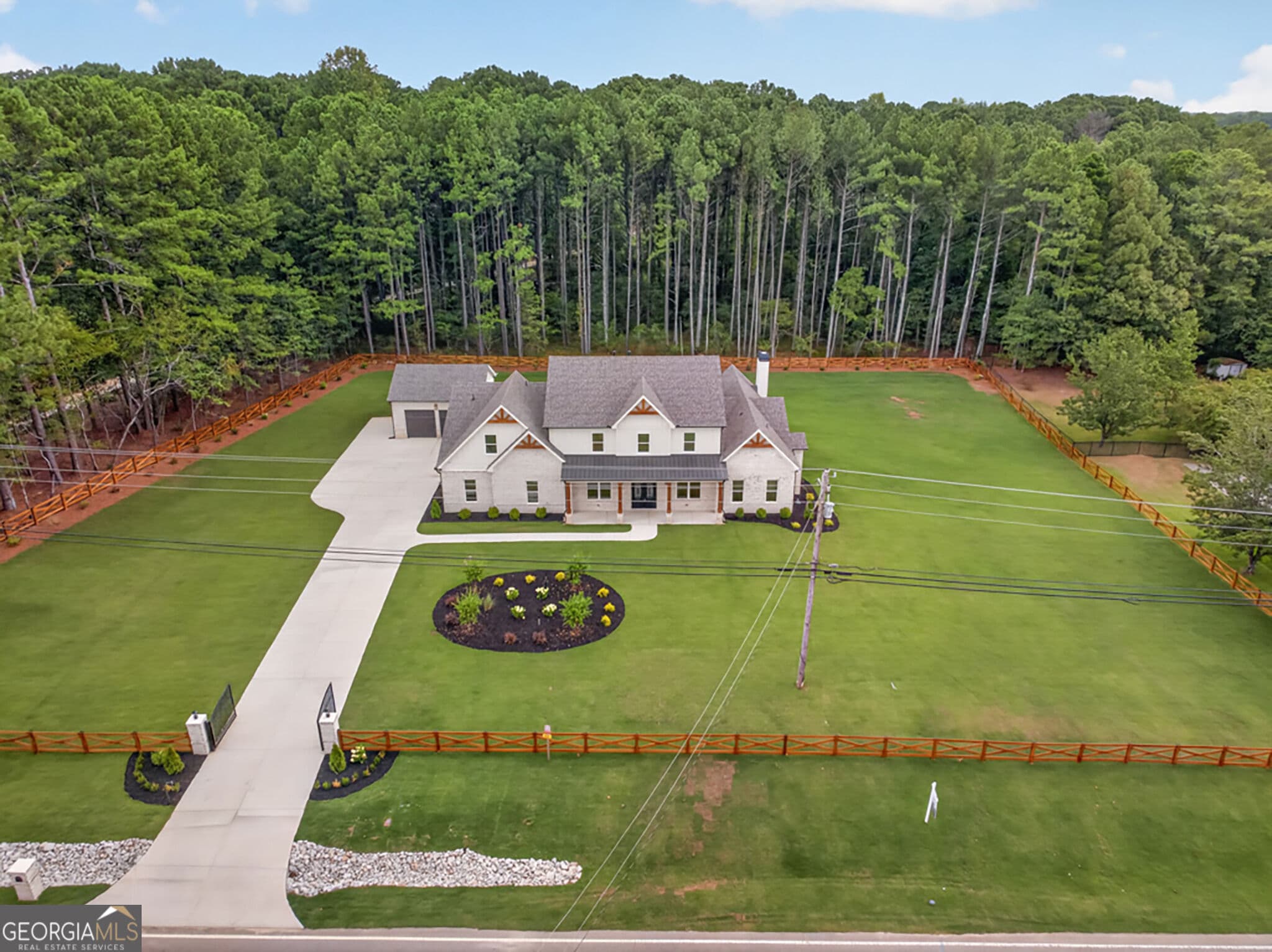5 bedroom, 5.5 bathroom, 5,163 sq ft single family residence for sale at 1556 New Hope Road, Lawrenceville, GA 30045 — photo 2