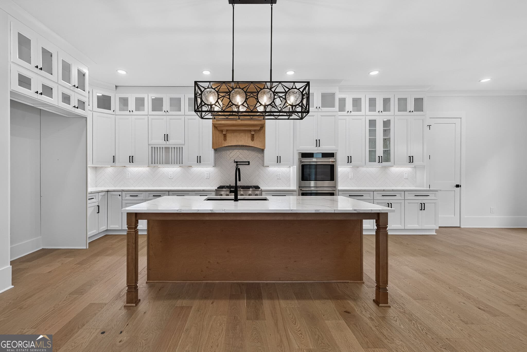 5 bedroom, 5.5 bathroom, 5,163 sq ft single family residence for sale at 1556 New Hope Road, Lawrenceville, GA 30045 — photo 4