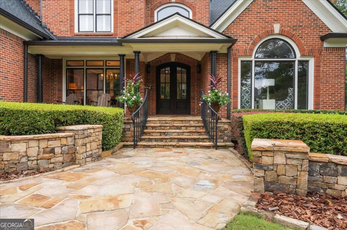 5 bedroom, 4.5 bathroom, 5,336 sq ft single family residence for sale at 10020 Normandy Lane, Suwanee, GA 30024 — photo 3